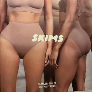 Skims high waisted brief. Size M